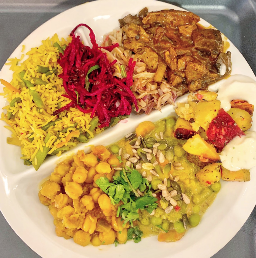 A photo of a plate of various Indian food from Sandokan, one of the best vegan restaurants in Prague 