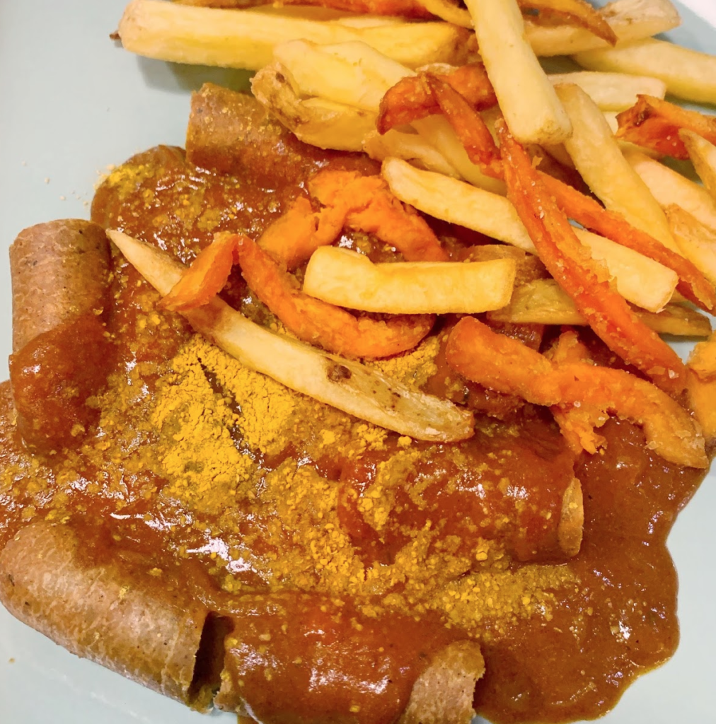 A photo of vegan currywurst from Forky's, one of the best vegan restaurants in Prague. 